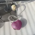 Detailed shot of sparkling pink rhinestone heart-shaped mini bag with beaded handle - Pink Round Diamond
