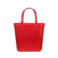 Fashionable red PVC jelly tote bag featuring star-shaped cutouts and stud details for beach - Red