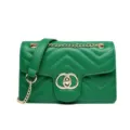 Green quilted crossbody bag with gold-tone chain strap and stylish circular buckle - Green