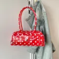 Fashionable red PVC polka dot underarm jelly bag with glossy finish and long shoulder straps - 28*8*12 / Red