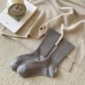 Grey ribbed thick wool mid-tube socks for women, cozy winter thermal wear options. - One Size / Light Gray