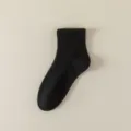 Women's solid black short cotton socks, comfortable daily casual ankle socks, simple basic hosiery. - Quarter / Black