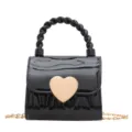 Stylish mini black PVC jelly crossbody bag featuring a gold heart lock and elegant chain strap - Black / 10.5*7*9cm