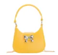 Stylish yellow PVC jelly handbag featuring a silver bow detail and gold chain strap - Yellow
