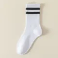 Women white athletic socks with classic black double stripes, comfortable cotton casual tube socks. - Double Stripe Mid Tube / Pure White