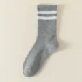 Comfortable women grey crew socks featuring white double stripes, ideal for casual and athletic wear. - Double Stripe Mid Tube / Gray