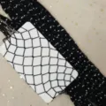 Detail view of black rhinestone fishnet tights, featuring sparkling crystals and mesh design. - One Size / BC-5066 Large Mesh Rhinestone Tights - Black