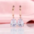 Elegante Ohrringe aus Roségold mit klaren Zirkonia-Kristallen in Birnenform - Ohrringe in Tropfenform mit Strass (Mit 925 Sterling Silber Ohrstecker) (T1-Rosegold) / Roségold