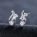 Elegante silberfarbene Unendlichkeitsschleifen-Ohrstecker mit klaren und schwarzen Steinen. - Unendlichkeitssymbol Strass Verflochtene Ohrstecker (T13-Silver) / Silber