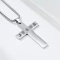 Macro view of beveled stainless steel cross necklace with hollowed JESUS letters - Cross Pendant Necklace / Steel