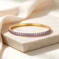 Close-up of golden stainless steel elastic bracelet with purple zircons - Light Purple Zirconia Bracelet / Light Purple