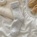 Grey wool thick warm slouch socks for women, cozy winter mid-tube socks with cute woven label. - One Size / Grayish White
