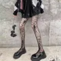 Black gothic fishnet tights with spooky spiderweb skull patterns for punk fashion lovers. - One Size / BC-5094 Skull and Spider Web