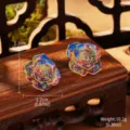 Macro view of Impressionist style floral enamel earrings with dimension and weight labels - Dark Blue Green Purple