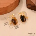 Boucles d'oreilles œil de tigre marron vintage, motif feuille, dimensions 2,0cm x 1,6cm, 7,5g - Style Feuille Ajourée Oeil de Tigre (2-22122D-6800)