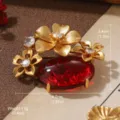 Close-up of vintage gold floral brooch with red stone, 4.0x3.4cm, 11g weight detail - Vintage Four Flowers Red Stone Style (7-3147A-6000)