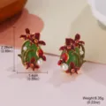 Close-up detail view of elegant vintage enamel flower earrings with white pearls - Red Flower Green Oval Stone Earrings