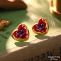 Macro view of vintage heart-shaped enamel earrings showing 2.1cm size and 7.75g weight - Red Heart Purple Floral (26253A)