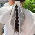 Elegant white floral lace hair ribbon scarf tied in a ponytail for a dreamy fairy look. - White Character