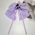 Detail view of purple textured chiffon bow hair claw clip with elegant streamers - Chiffon Bow Claw Clip / Purple