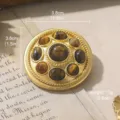 Vintage style round gold-tone brooch with tiger eye stone inlays, 1.5 inch size - Vintage Round Flower Style (BR1-2653-7500) / Dark Brown