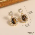 Elegantes pendientes vintage de ojo de tigre con agujas de plata 925 y cristales. - Estilo de Colgante Vertical (2-22572I-6800)