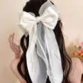 Large white ribbon bow hair clip with organza streamers for elegant hairstyles - White
