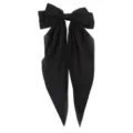 Close-up of a large black chiffon bow hair clip with long elegant ribbons on white background - Black
