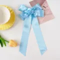 Elegant light blue satin ribbon bow hair clip with a handmade fabric rose - Sky Blue