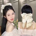 Elegant champagne chiffon bow hair claw clip for stylish voluminous bun hairstyles - Satin Bow Spring Clip / Beige