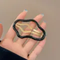 Stylish irregular wavy black and gold metal BB hair clip for fringe and side hair styling - Black