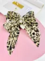 Elegant leopard print pleated bow hair clip with pearl accents for stylish women - Crinkled Leopard Print