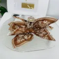 Elegant large brown paisley print bow hair claw clip, high-end shark clip hair accessory - Paisley Khaki