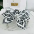 Elegant large white fabric bow hair claw clip with classic black paisley print for women - White Paisley