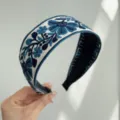 Retro bohemian wide headband with blue floral embroidery on white fabric detail view - Wide Headband / Blue Floral