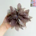 Detailed view of a large iridescent fabric flower scrunchie with crystal charms - Brown Green + Mesh Bud Hair Tie