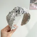Elegant white knotted headband with black ink splatter pattern for women - Polka Dot Floral Knot Style / White