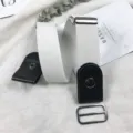 Detail view of a white elastic buckle-free belt for women, stretch jeans waist belt minimalist. - White