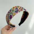 Detailed view of bohemian floral embroidered wide headband with vintage ethnic pattern - Wide Headband / Purple Rice Floral