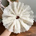 Close-up of white double-layered lace scrunchie with delicate embroidery - Lace hair tie