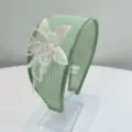 Detail of handmade beaded flower headband in sage green with elegant white petals - Green (S729)