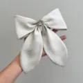 Large cream satin bow hair clip with decorative camellia flower center for women - Off-White With Flower Bow Spring Clip