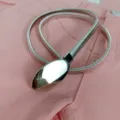 Ceinture élastique argentée en métal avec boucle ovale, idéale pour robes et pulls. - Argent