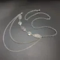 Silver-toned ethnic waist chain with embossed floral charms and blue stone details for dresses. - Green Stone Embossed Tassel Waist Chain (Style Two) / Silver