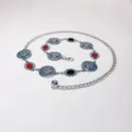Bohemian silver metal waist chain featuring embossed round medallions and stones for dresses. - Silver Hat Red And Black Gemstone Waist Chain / Silver