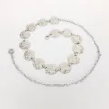 Silberne Taillenkette aus Metall mit schönen gehämmerten Scheiben für Kleider und Jeans. - Wellenmünze / Silber