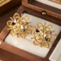 Detailed macro shot of vintage-style gold bee earrings with colorful enamel and stones - Vintage Floral Insect Style (E4-20521B)