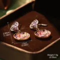 Detail of enamel swan heart drop earrings showing 2.85cm height and 7g weight specs - Heart Swan Shape (2-26992-7000)