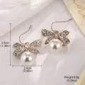 Detaillierte Größen- und Gewichtsangaben für elegante Perlen-Schleifen-Ohrringe mit Kristallen - Hohl Schleife Hochglanz Perle (2-18772-4750)