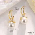 Detaillierte Ansicht eleganter goldener Perlenohrringe mit glitzerndem Bogen - Hohl Doppelring Schleife Perle (2-21538-4100)